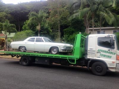 White Car on Tow Tray - Towing Services in Mount Sheridan, QLD