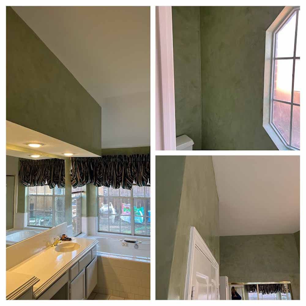 Bathroom with olive green walls, white trim, a window, and white fixtures.