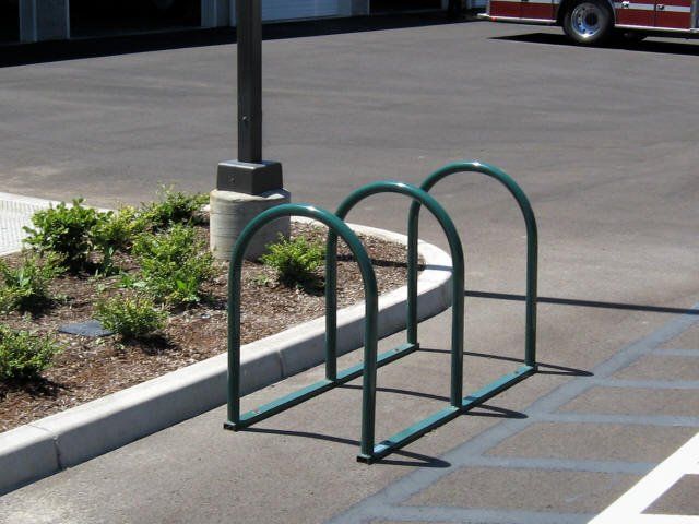 Bike rack with green paint — Junction City, OR — Radius Pipe Bending & Fabricating