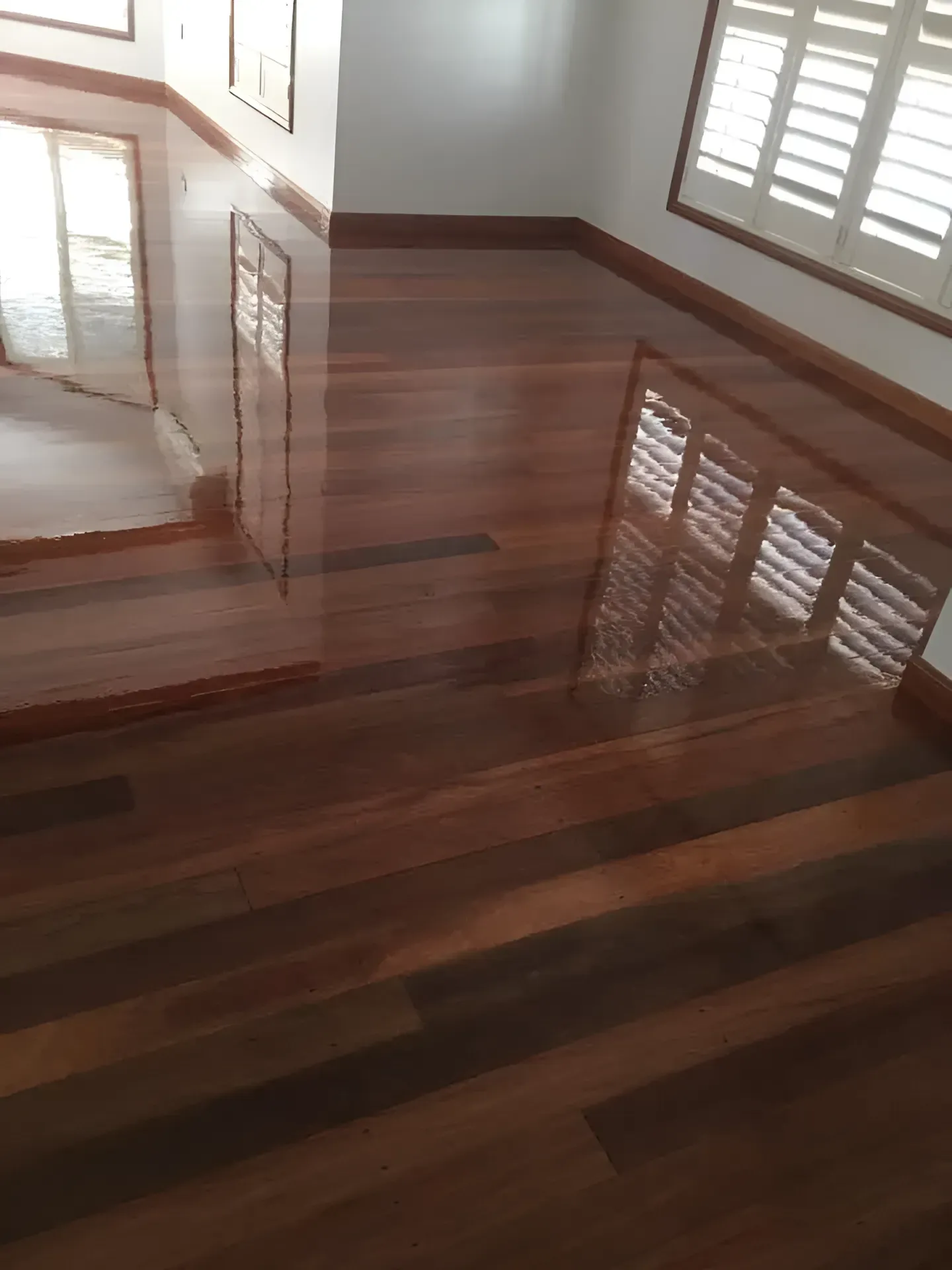 Shiny Polished Floor and Window with Shutters — Toowoomba Polished Floors in Clifton, QLD