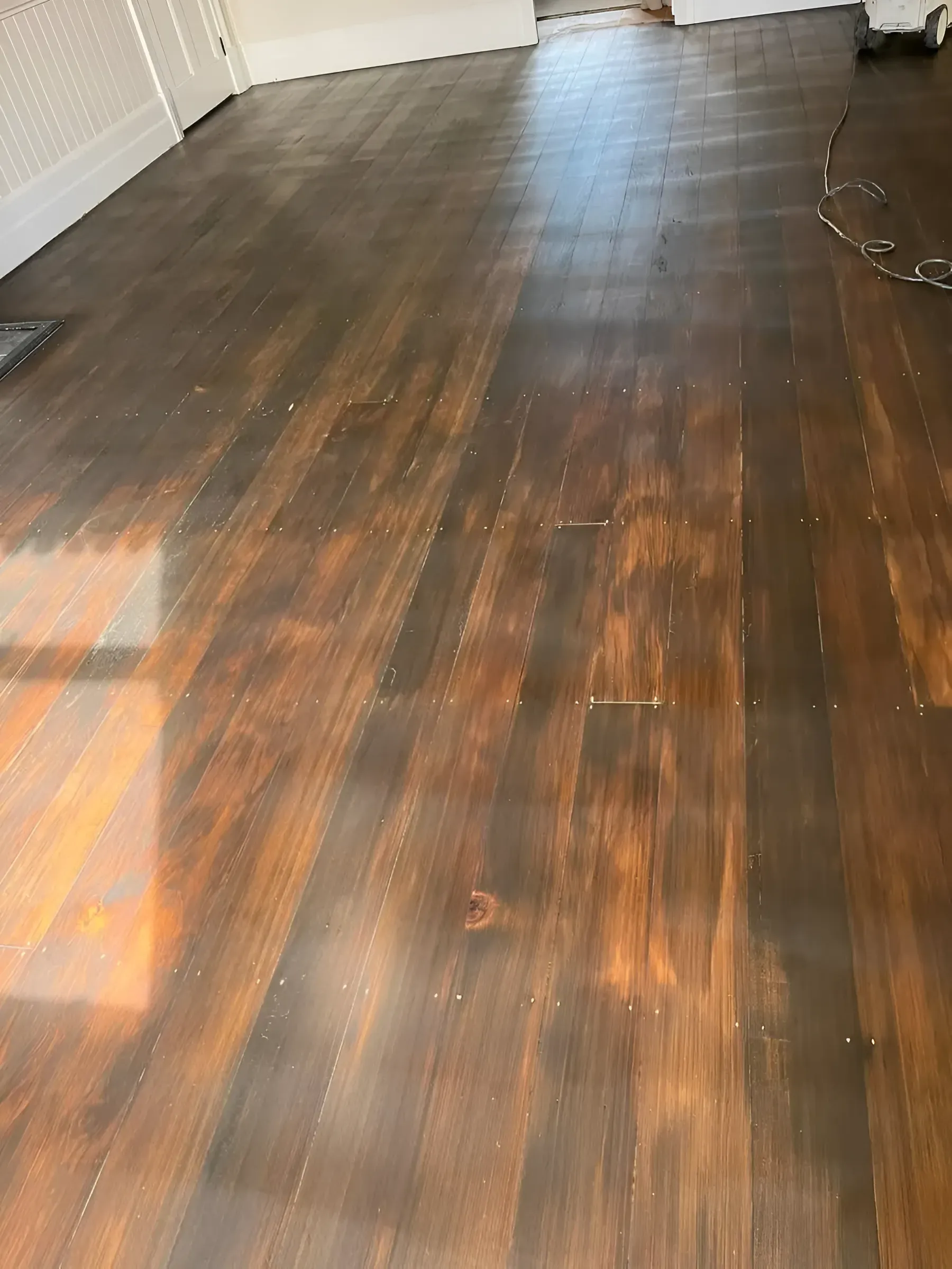 Dark Stained Wooden Floor with A Glossy Finish — Toowoomba Polished Floors in Clifton, QLD