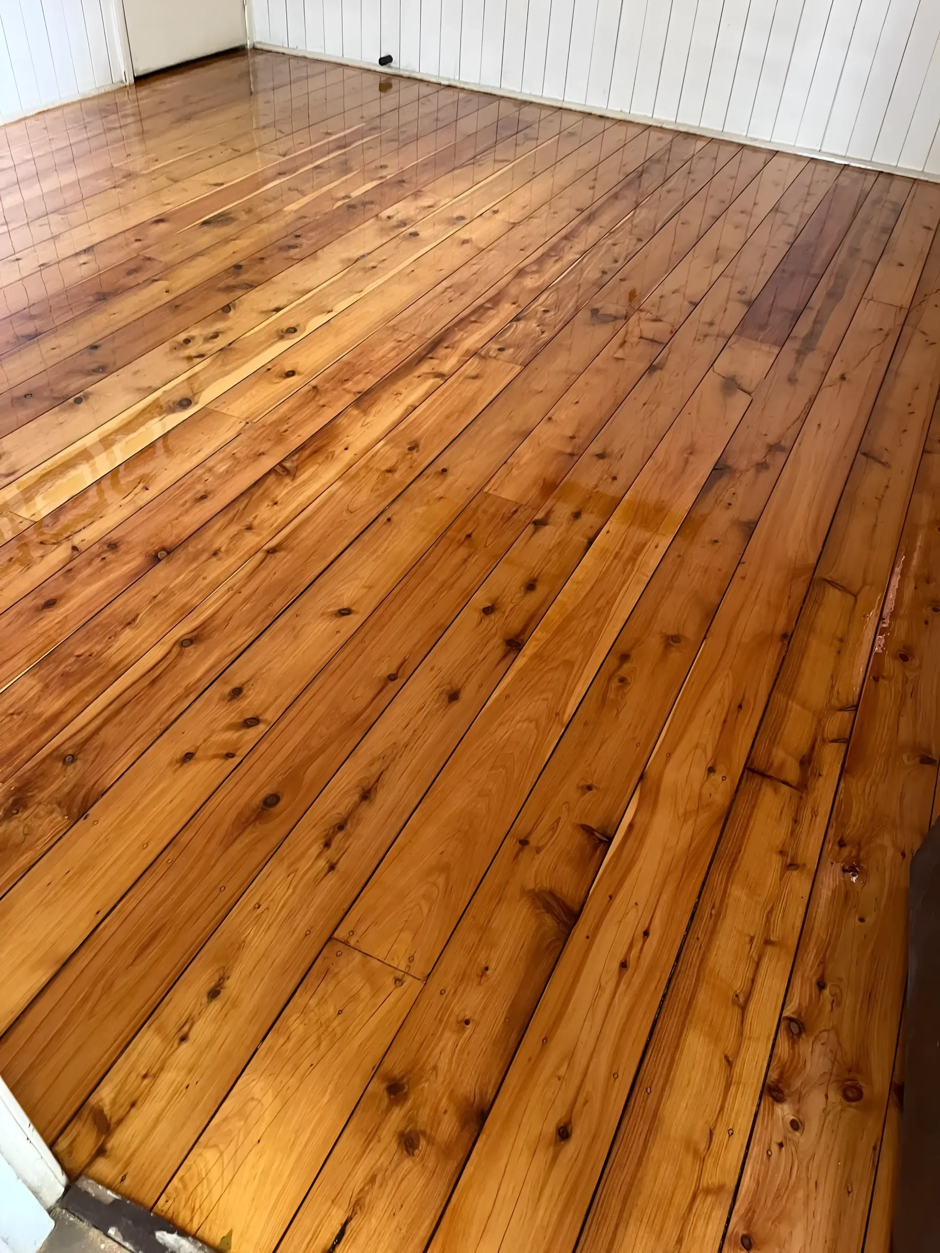 Wooden Floorboards Light Brown with Glossy Finish — Toowoomba Polished Floors in Toowoomba, QLD