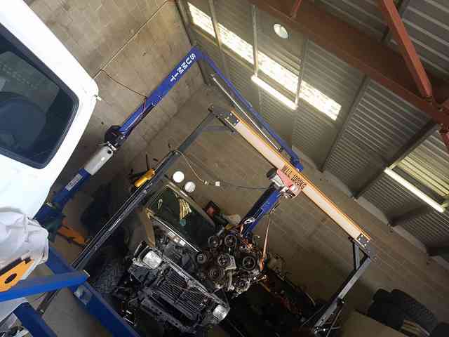 Engine Vehicle Lifted by Lifter —  4x4 Specialist in Townsville, QLD
