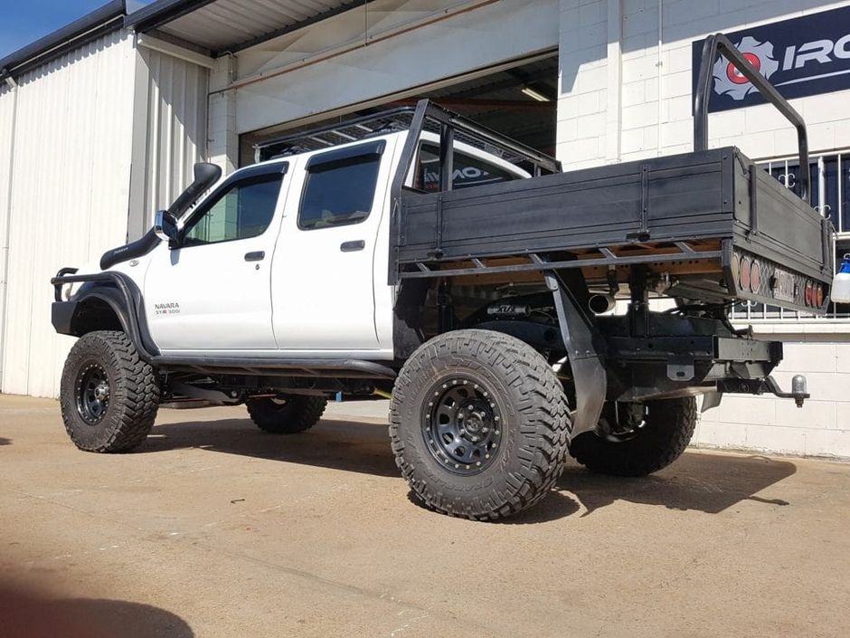 White Pickup Truck with Custom Parts —  4x4 Specialist in Townsville, QLD