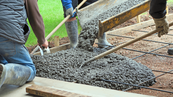 Local concrete contractors pour a new driveway with a broom finish in bridgeport, CT