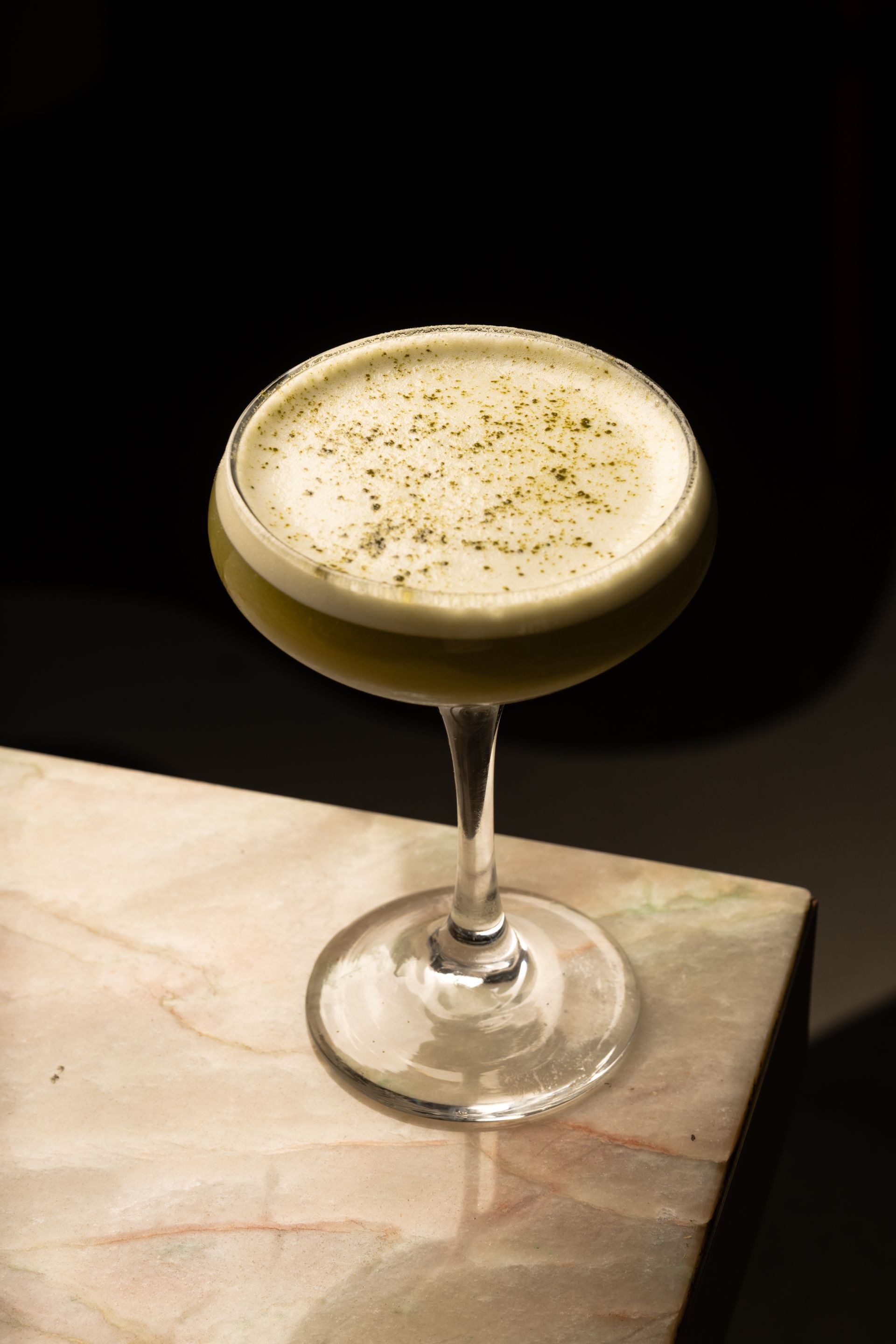 Matcha Martini on table edge