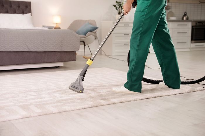 worker cleaning the floor