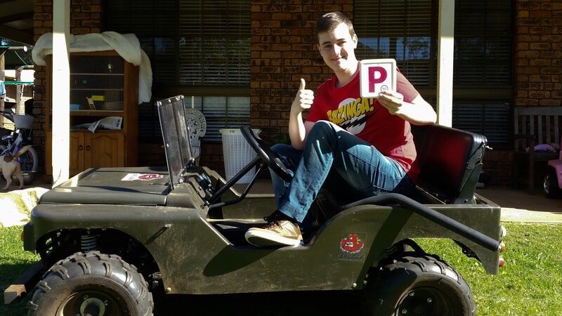 Boy Handling Card — Driving School in Wollongbar, NSW