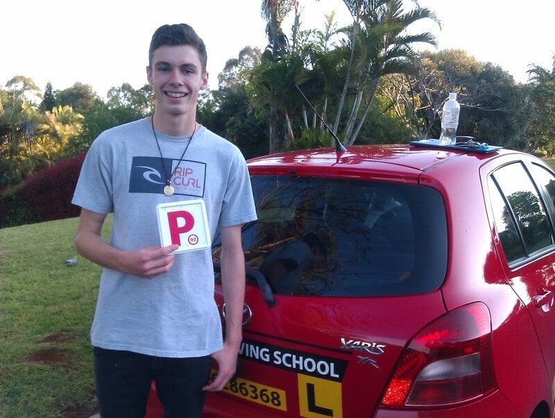 Boy with Red Car — Driving School in Wollongbar, NSW