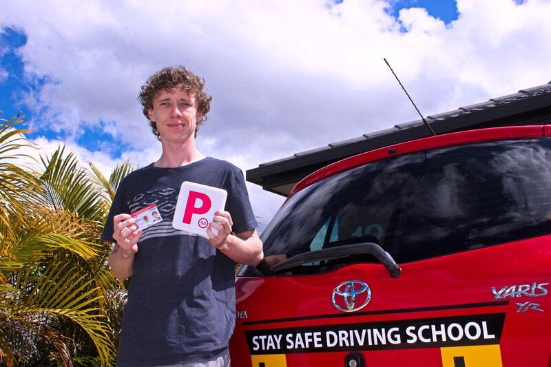 Man and Red Car — Driving School in Wollongbar, NSW