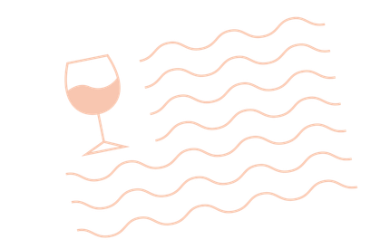 A glass of wine is sitting on top of a wave.