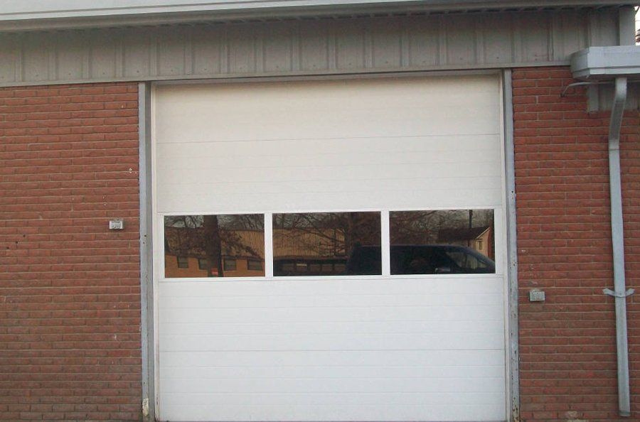 If You Need a New Garage Door With Large Windows in Mid-MO, Call Glenn’s Garage Doors.