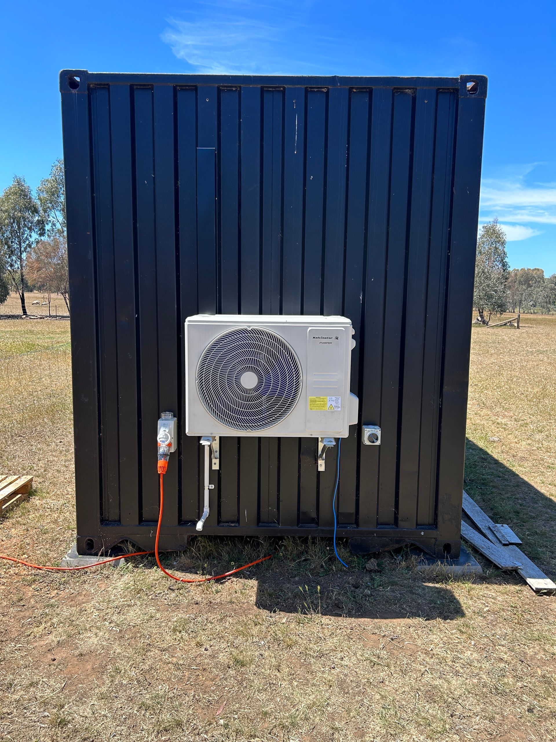 AC Unit Mounted On Metal Wall — Bendigo, VIC — Evolve Heating and Cooling