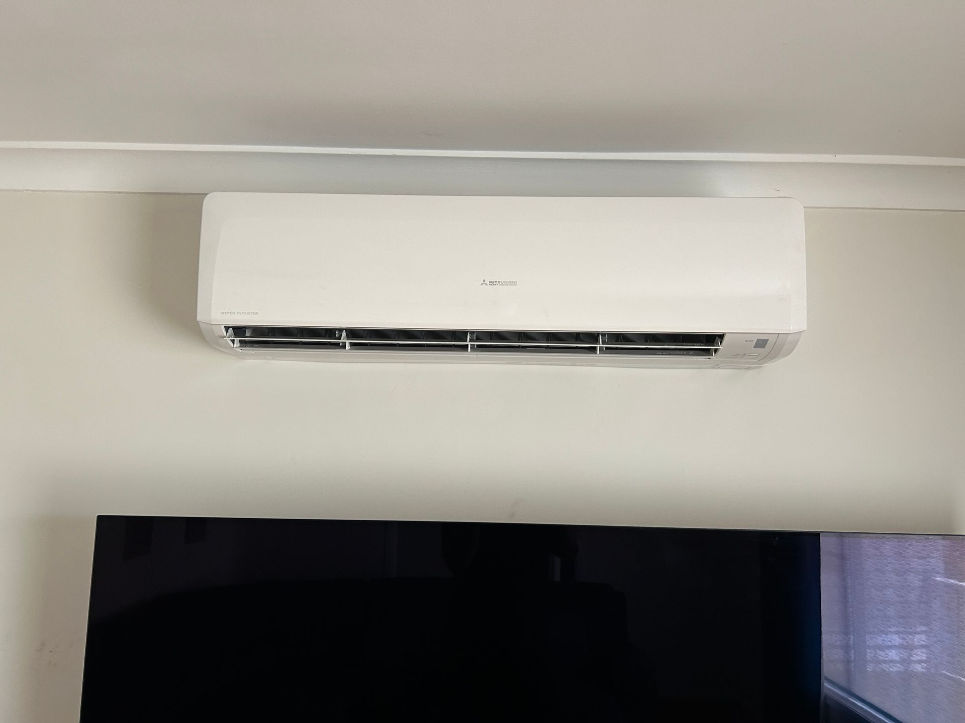 White AC Mounted On Wall — Bendigo, VIC — Evolve Heating and Cooling