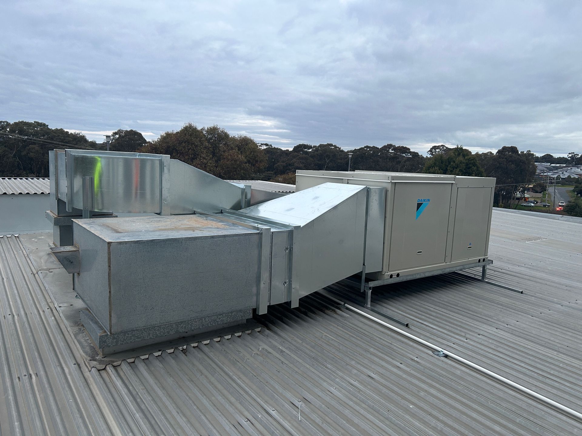 Package Unit Replacement With Trees Background — Bendigo, VIC — Evolve Heating and Cooling