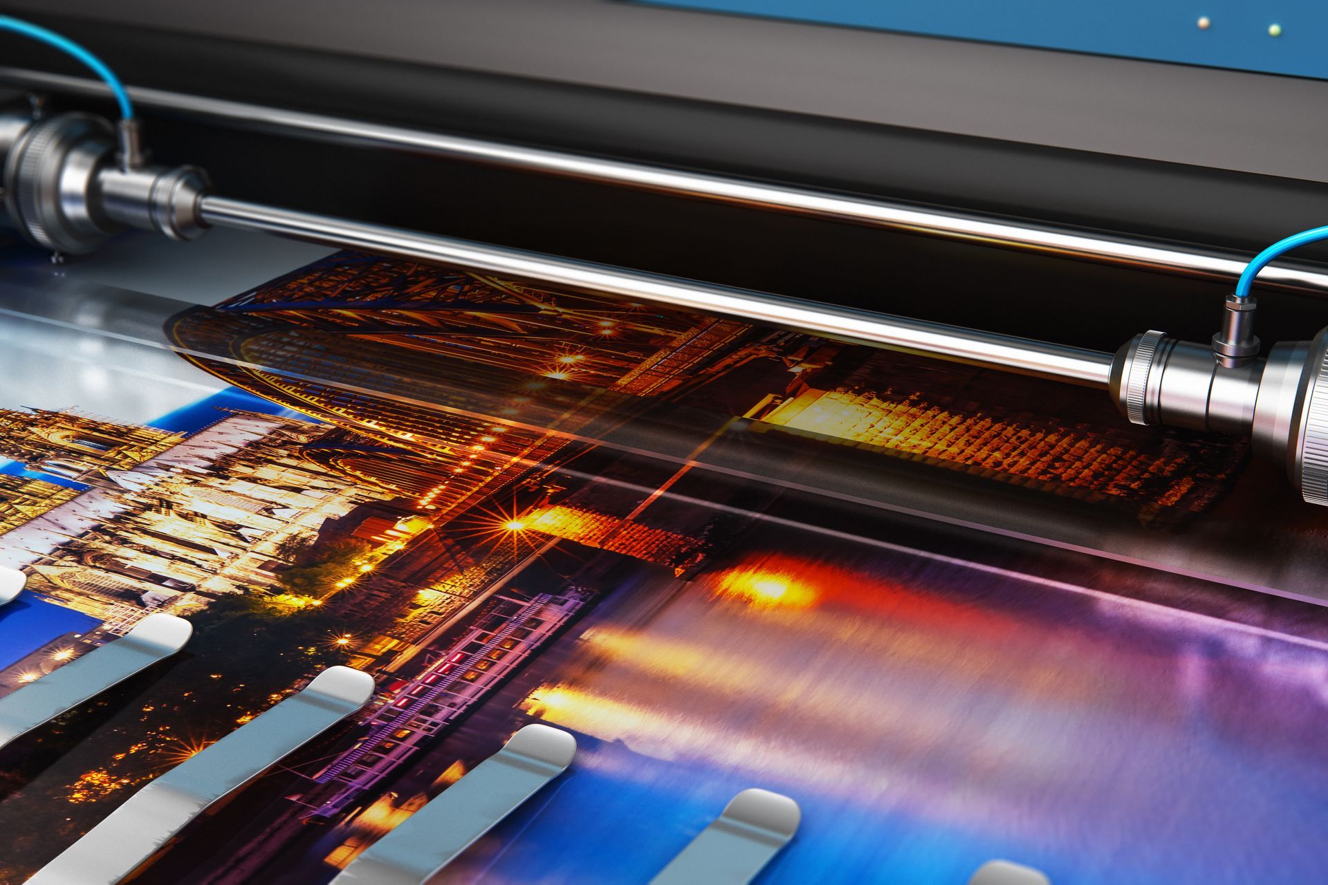 A close-up of a high-tech industrial printer with a glowing laser beam scanning across a printed color image.
