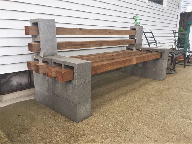 Fire pit with cinder block benches and stone surrounding.