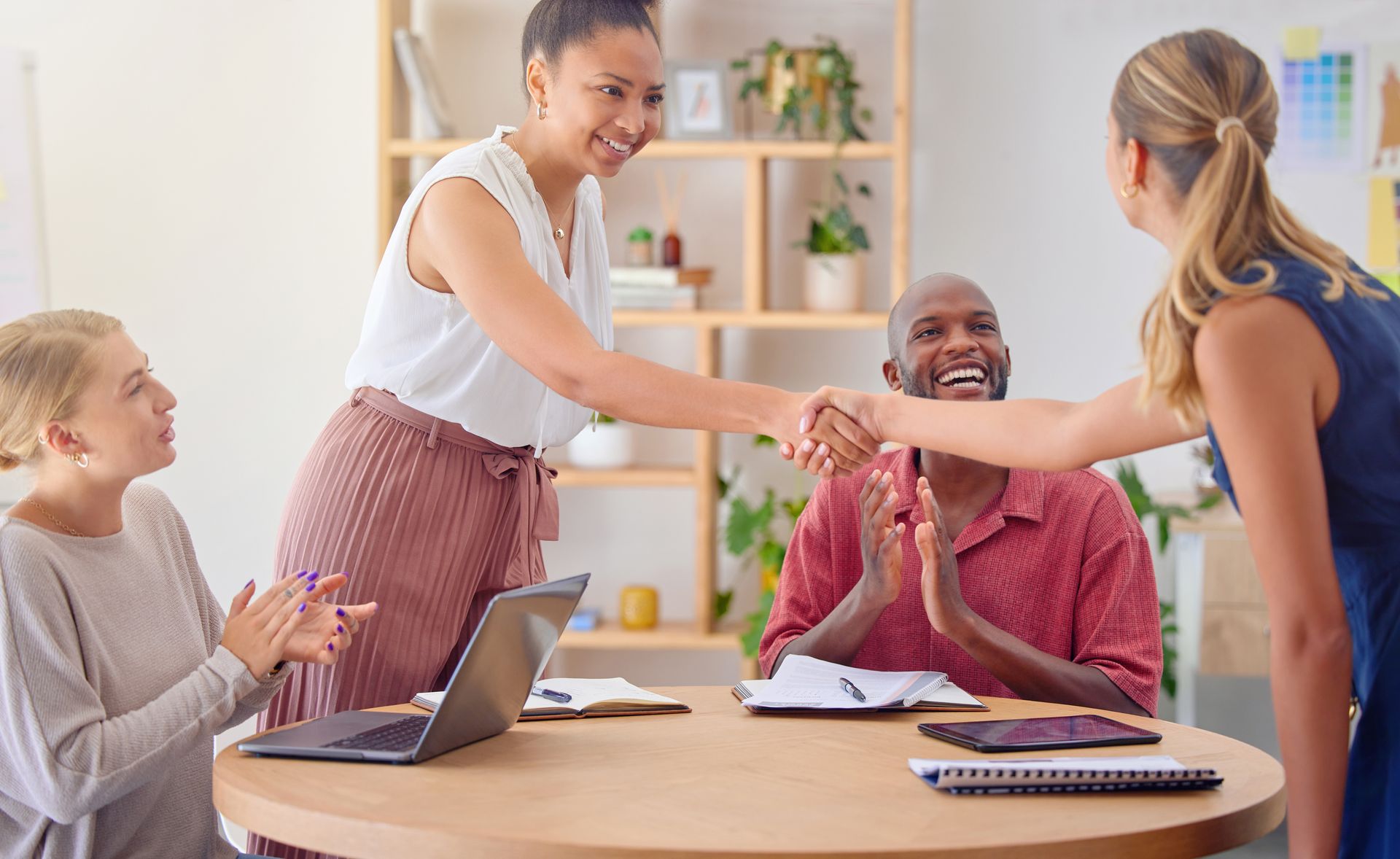 partners shaking hands after earning each others trust