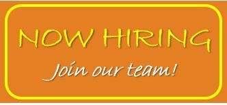 A sign that says `` now hiring join our team '' on an orange background.