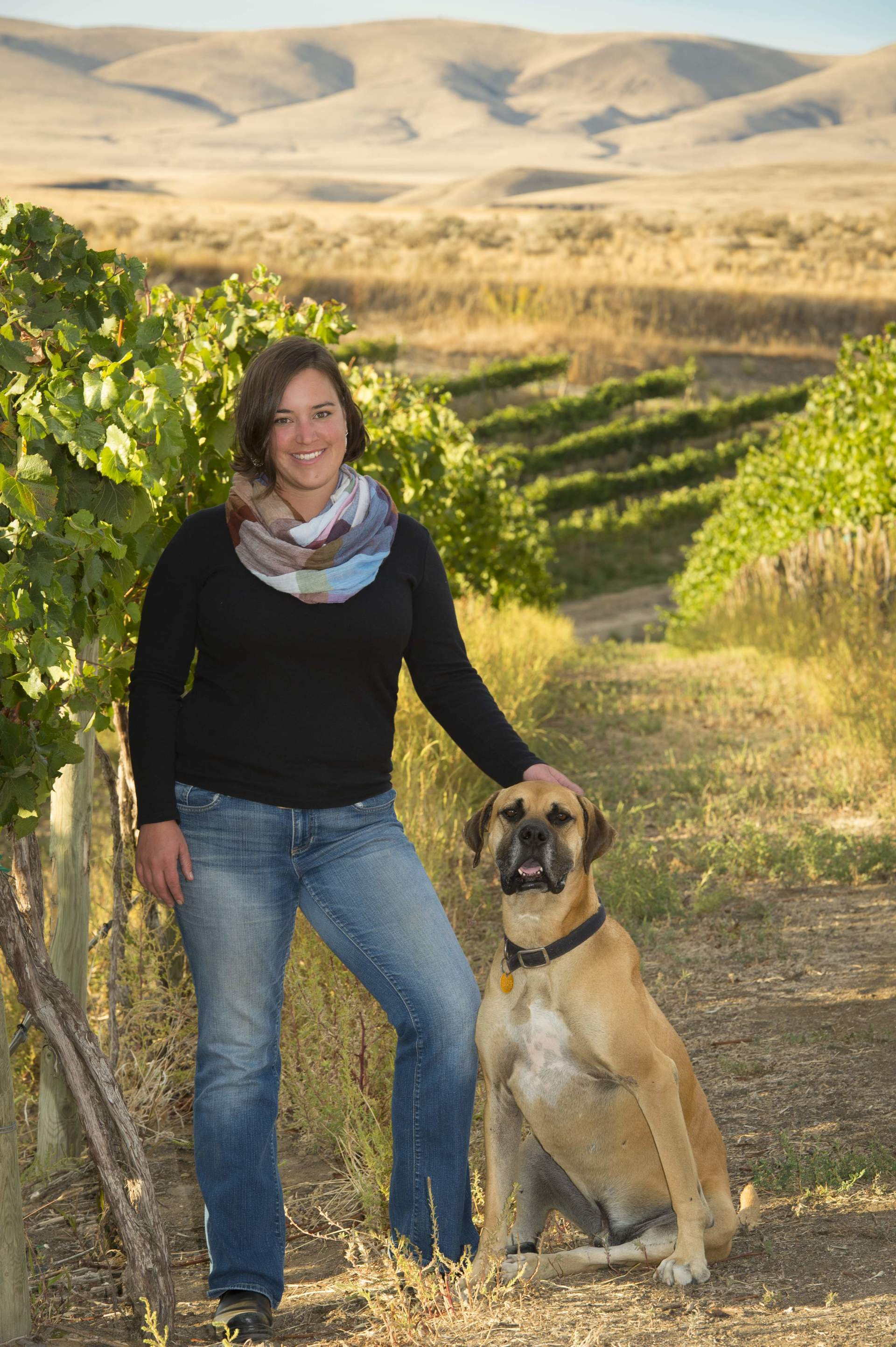 Winemaker Kerry Shiels with her dog in DuBrul Vineyard