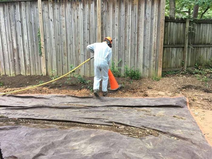Professional Worker Restoring a Soil