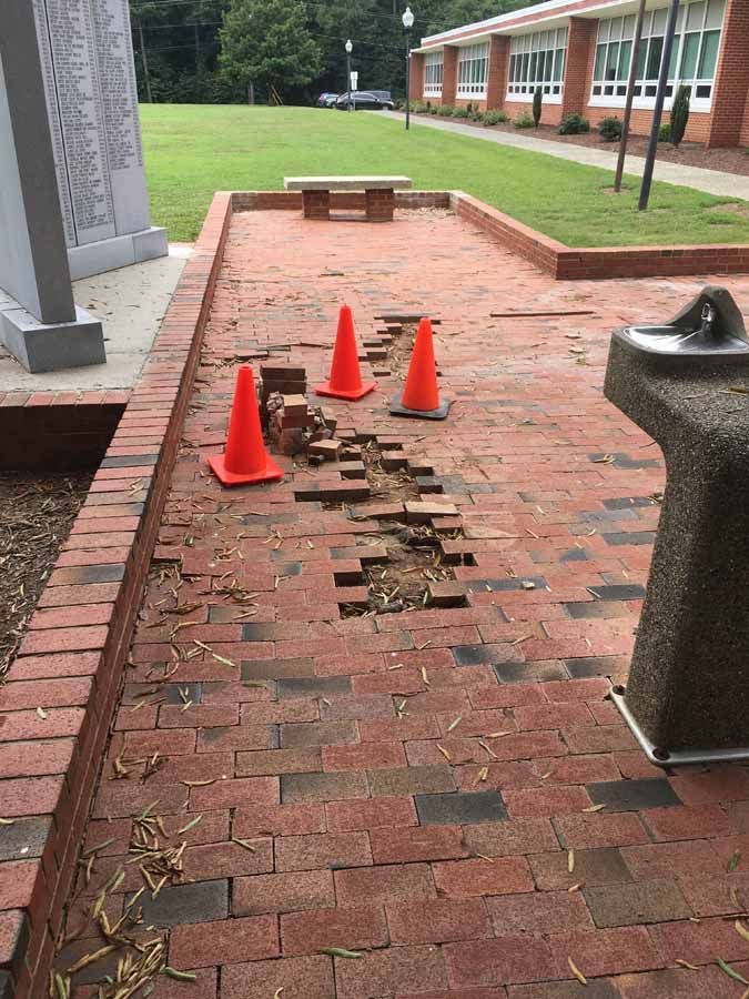 Damaged Floor With Orange Cones