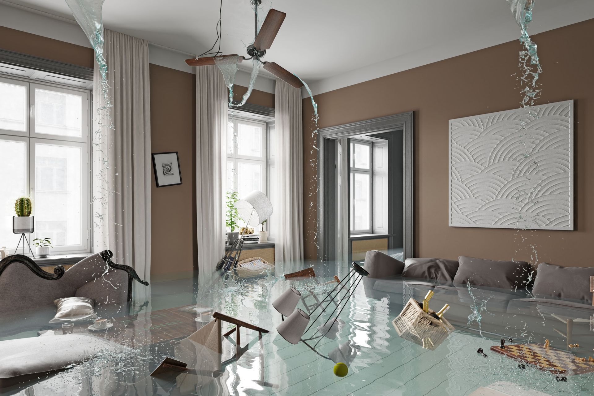A living room flooded with water and a ceiling fan.