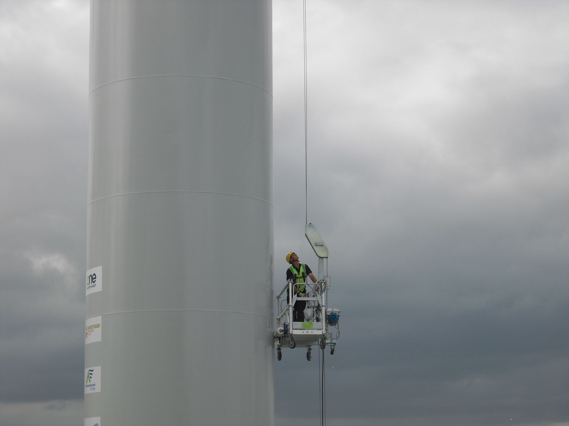 Suspended platform used for accessing wind turbine tower and blade for maintenance.