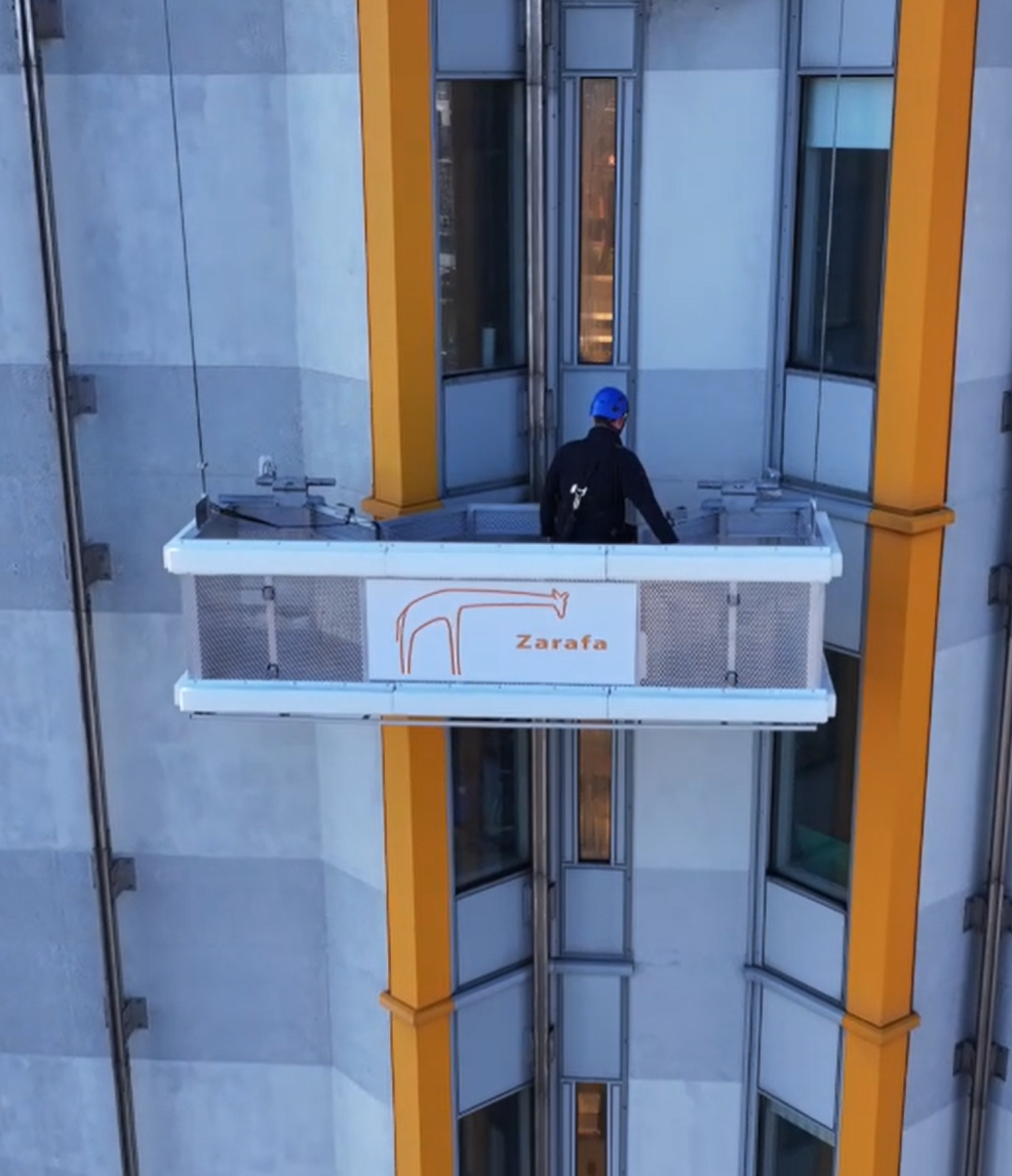 Man riding in a replacement Building Maintenance Unit on Belfast City Hospital as provided by Zarafa Group.