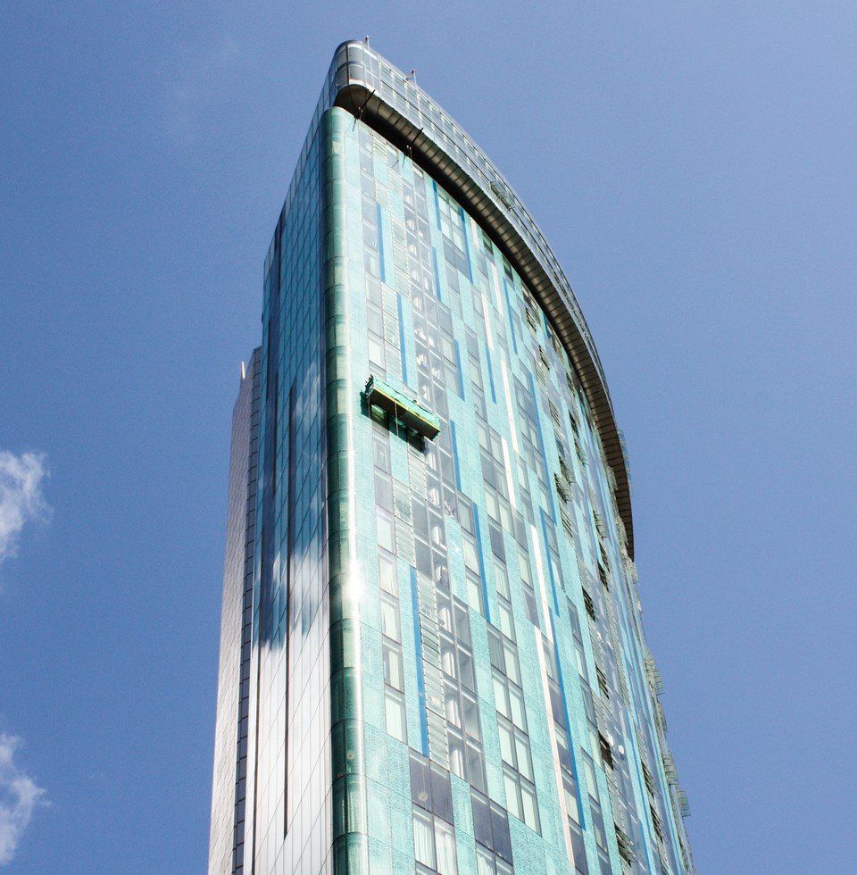 Suspended platforms for facade access and maintenance