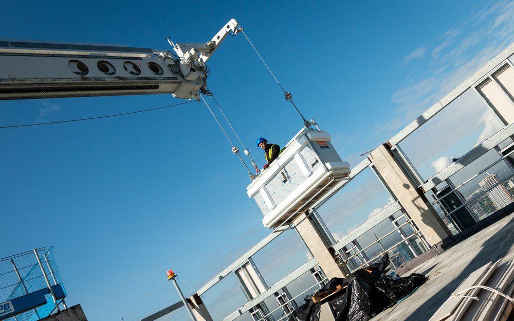 Cradle for facade access and maintenance