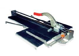 Tile cutter with black base, silver parts, and a red handle.