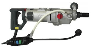 Gray and black electric core drill with a handle, hose, and control box.