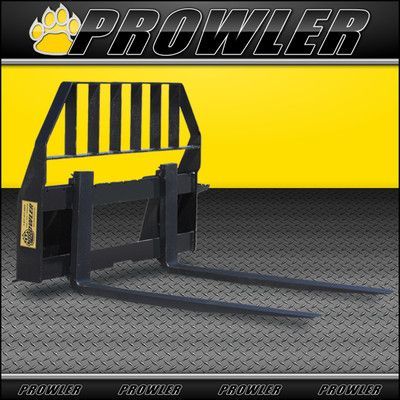 Black Prowler skid steer forklift attachment, yellow background, gray diamond plate.