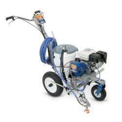 Gas-powered road paint striper with a blue hose and a white bucket.