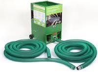 Green hose reel with two coiled hoses connected, with a green box-shaped dispenser on wheels.