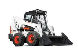 White Bobcat skid-steer loader with black cab and bucket, orange wheels, on a white background.