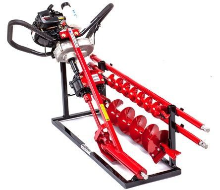 Red gas-powered post hole digger with a black frame, ready for ground use.