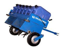 Blue Bluebird cart with fuel containers.