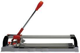 Red and silver tile cutter on a gray base, with a lever handle.