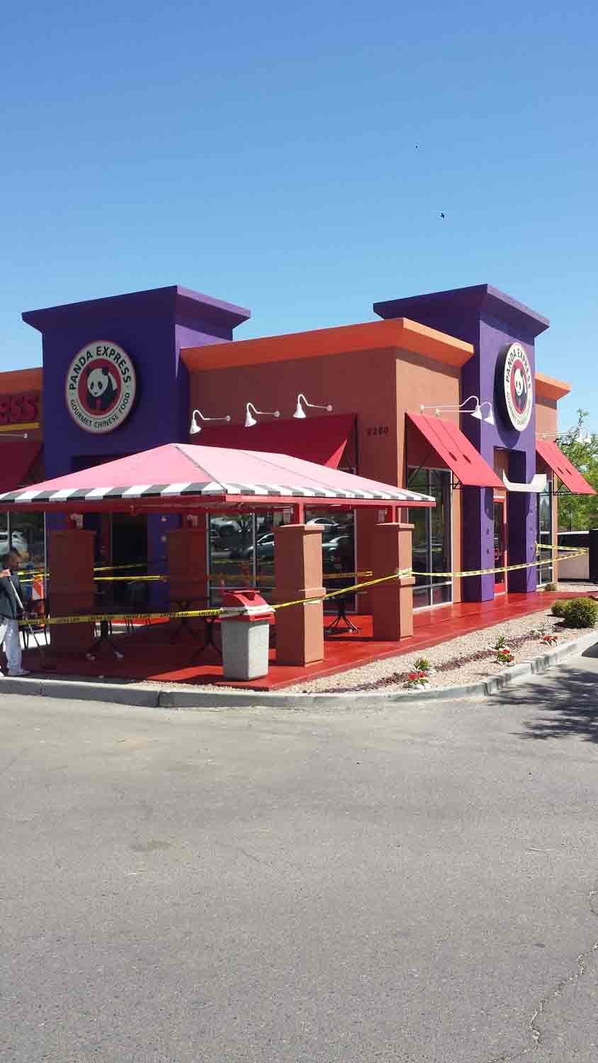 A purple and orange building with a sign that says panda express