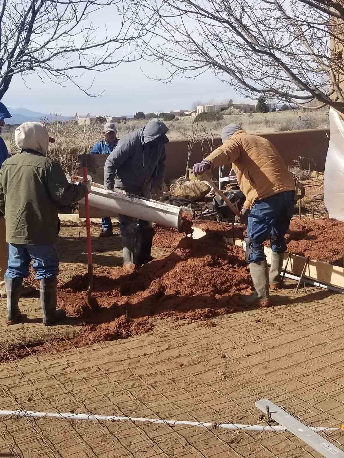 A group of people are working on a construction site