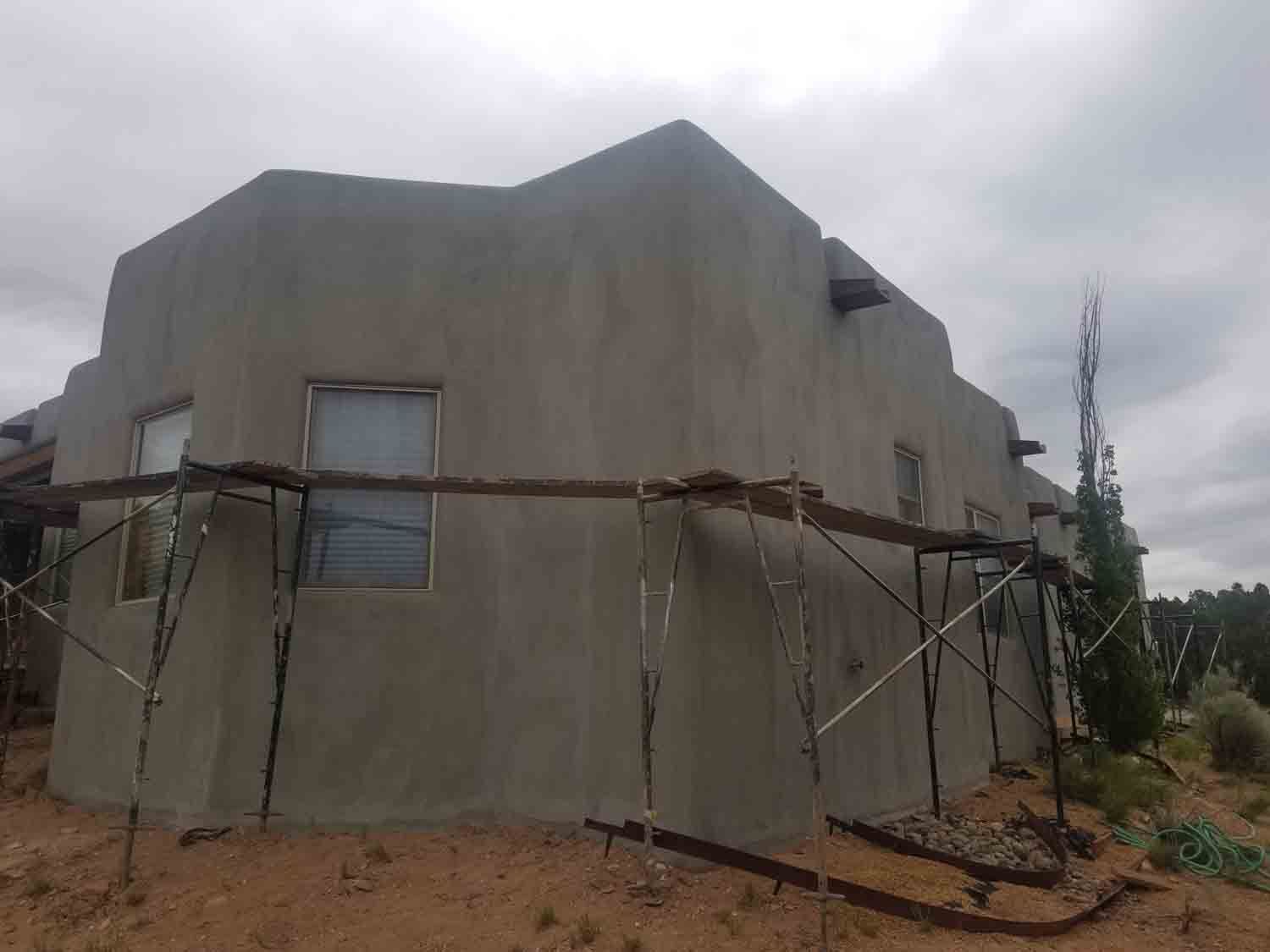 A large building is being built with scaffolding around it.