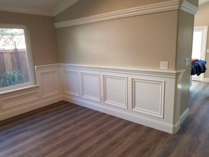 There is a window in the corner of the room.