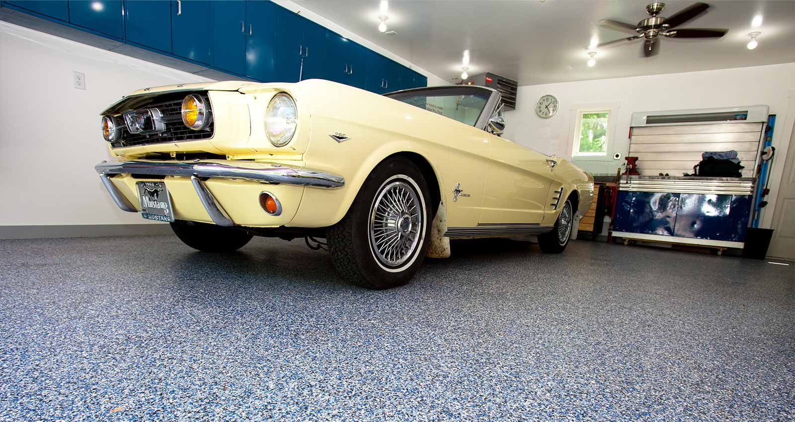 Concrete coated garage floor with car parked