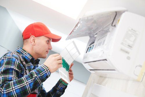 Man Repairing AC