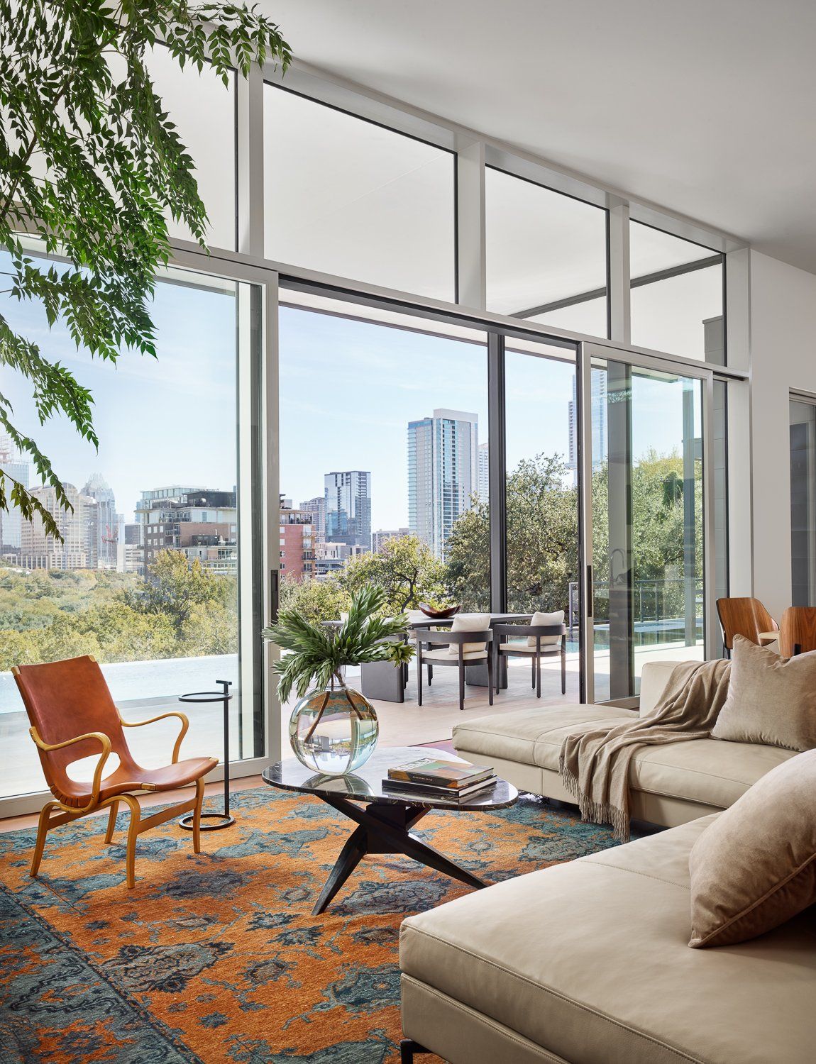 A living room with a couch a chair and a coffee table