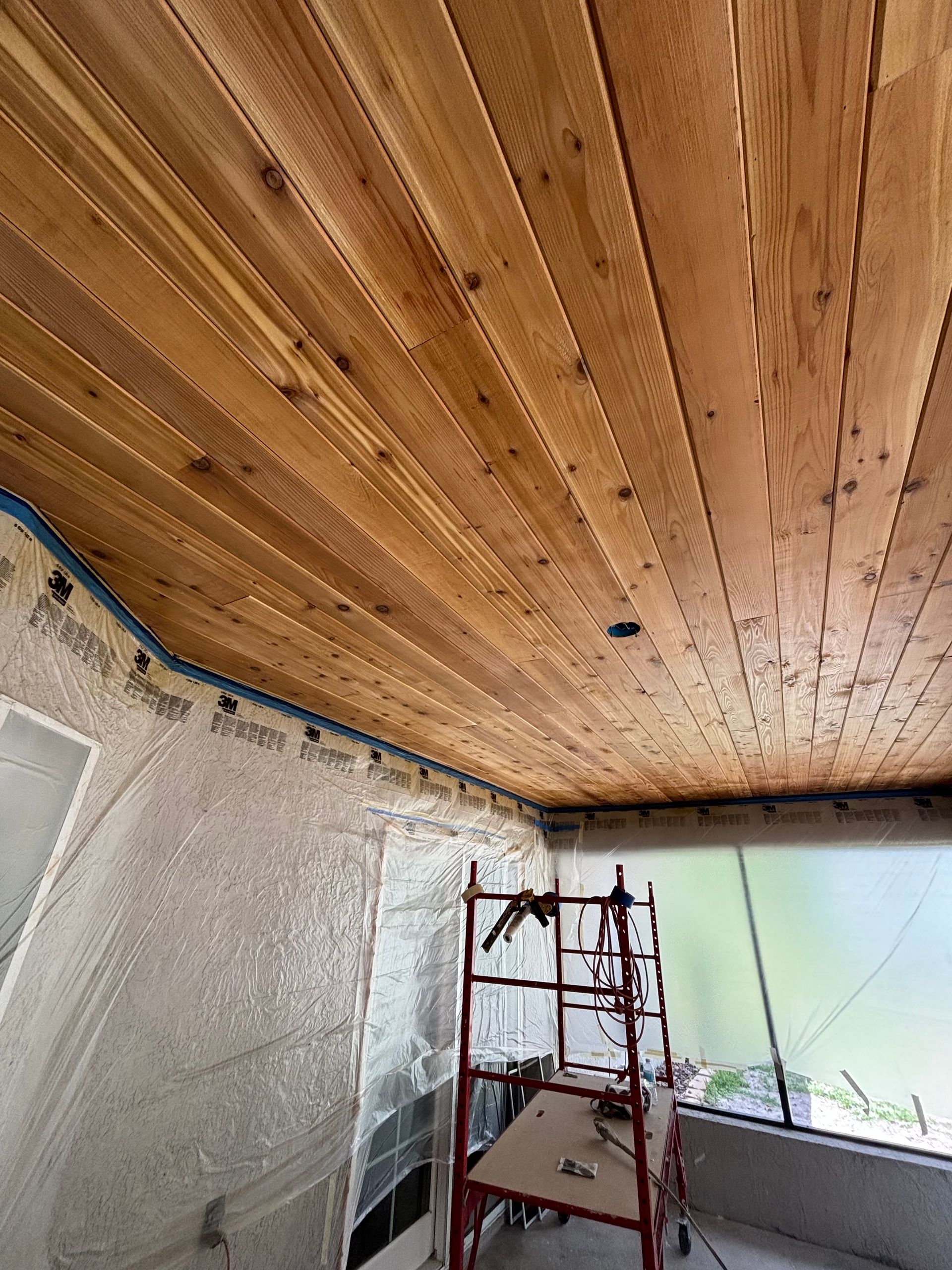 installed a cedar ceiling and stained and sealed in a Deland, FL back porch renovation