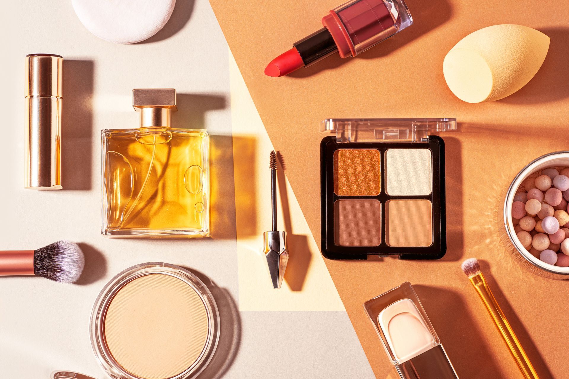 There are many different types of makeup products on the table.