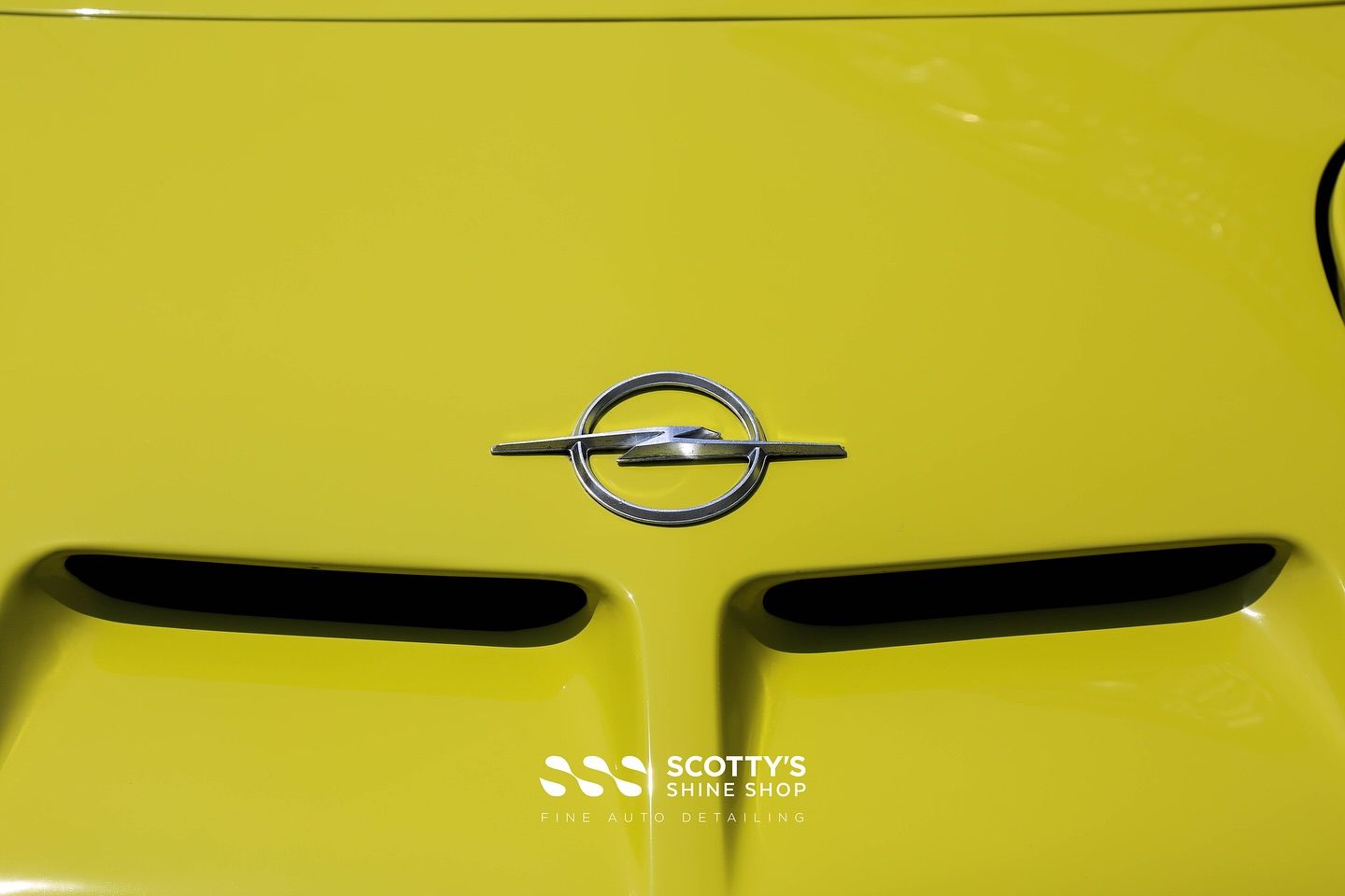 1970 Opel GT Paint Correction , Modesta BC-X Ceramic Coating hood emblem close up London, Canada